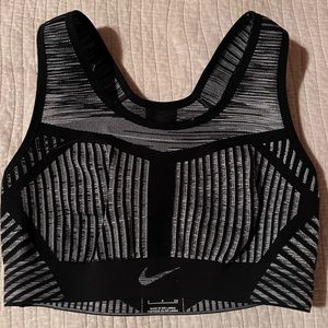 Grey and black Nike sports bra size small in women’s.